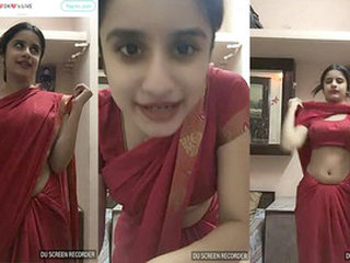 Adorable webcam model reveals her intimacy in a seductive saree