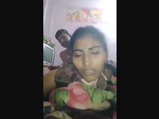 A mature wife's buttocks are widened from behind