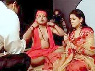 A sultry Indian wife (bhabi) being intimate with her husband (baba)