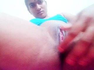 A seductive woman pleasures herself on film