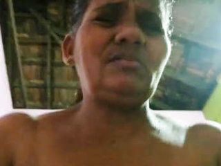 Busty older woman's passionate arousal on display