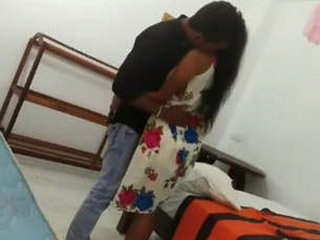 A Sri Lankan university student named Ruhunu climaxes while being pleasured by her partner's large penis
