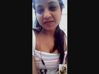 Indian beauty reveals her large breasts in part 2 of this sensual video
