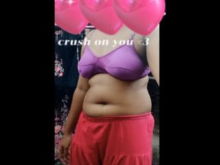 A South Asian college student undresses and displays her attractive physique while taking a bath