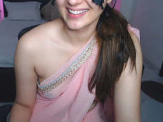 Arelative in a sheer saree reveals her fair breasts and speaks explicitly about them