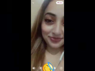 A stunning and seductive woman displays her physique in a provocative film, highlighting her beauty and allure.