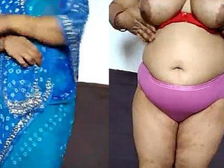 Indian wife with large breasts undresses and displays them