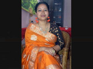 Desired Assamese woman, Padmaja Gogoi, pleasuring herself with an eggplant and displaying ecstasy