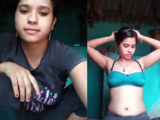 A charming Indian lady displays her breasts, intimate area, and buttocks