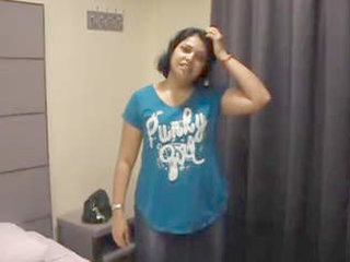 An alluring Indian woman sensually disrobes and performs oral sex
