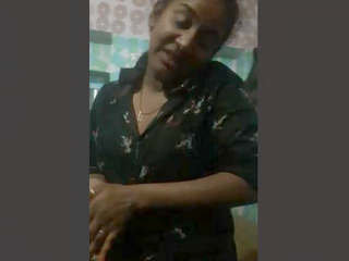 Indian escort fondles her breasts and prepares for intimacy