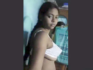 Additional videos of a seductive Bengali woman with large breasts