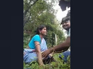 Two Odia individuals engage in intimate outdoor activity