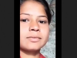 Village girl flaunts her ample bosom in the open air