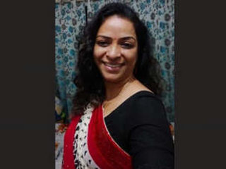 Indian housewife with large breasts shares additional videos
