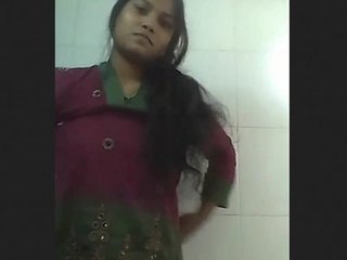 Charming brunette woman displays breasts