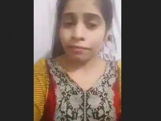 A wife dresses up and records an intimate video for her husband