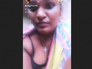 Indian housewife Keethi reveals her breasts in a live broadcast