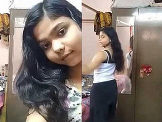 Indian girl's intimate self-portrait showcasing her voluptuous and attractive rear end for her boyfriend