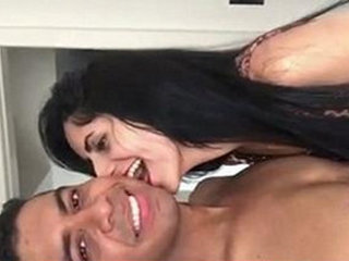 An Indian beauty passionately kisses and performs oral sex on a man's penis