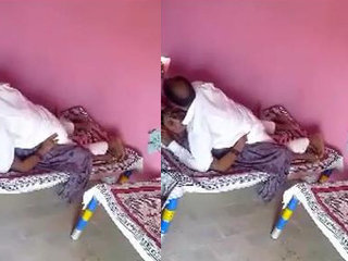 A sultry South Asian woman indulges in a passionate encounter with her neighbor, showcasing her ample breasts and expert oral skills