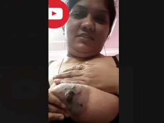 Indian Punjabi bhabi with large breasts on display