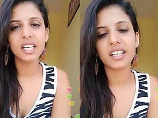 Beautiful Indian woman broadcasts in the morning with lovely bosom
