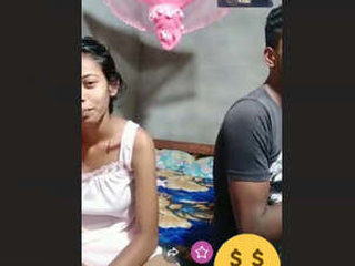 Aroused Sri Lankan couple engages in explicit acts on camera with their unconventional clan