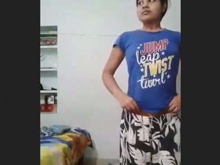 A lovely woman enjoys creating a video