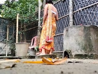 Village beauty takes nude bath in the countryside