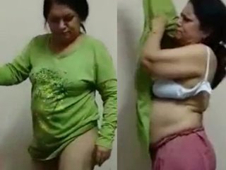 Elder aunt filmed during wardrobe change