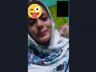 A pretty Indian novice shares her beauty in a seductive display