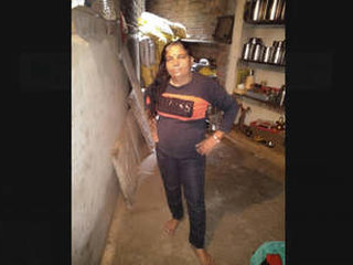 Aroused girl pleasuring herself with oral and manual stimulation