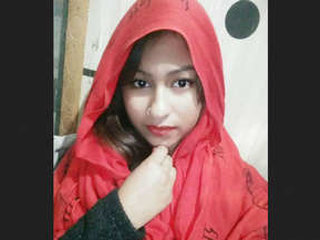 Aroused Indian girl pleasuring herself with a sex toy