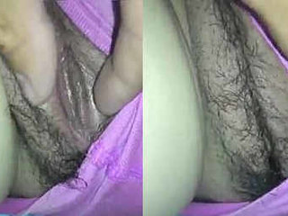 Wife's vagina stimulated by husband's fingers