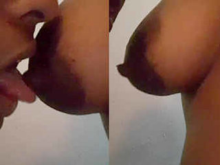 Indian aunt's breasts get a passionate oral treatment