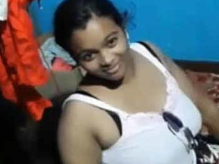 A seductive Indian woman performs on camera