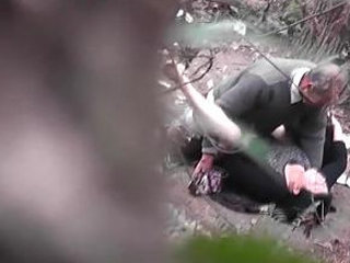 Indian elderly man engages in outdoor intercourse with a youthful performer in the woods