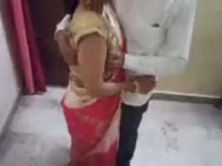 Nila, a teacher in a saree, gets intimate with her boyfriend and their friend films it
