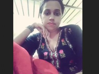 Bhabhi strips down to her lingerie and teases her lover in a video