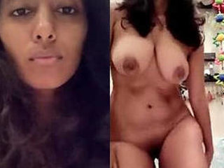 Watch a busty Indian girl flaunt her assets in a sensual show