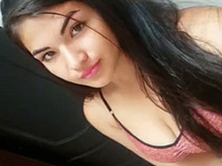 Gorgeous girl pleasures herself with her fingers