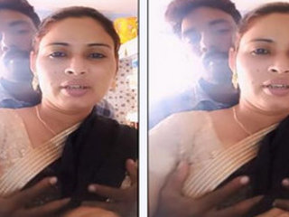 Desi bhabi's boobs pressing on a board