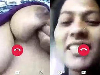 Indian Desi beauty flaunts her big breasts in a video link with a friend