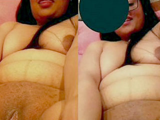 Indian wife pleasures herself with a bottle