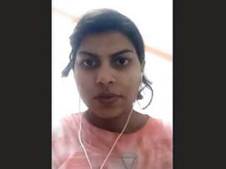 Exclusive video of an Indian girl flaunting her breasts