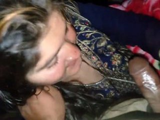 Pakistani auntie gives a blowjob to her nephew's cock