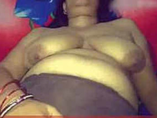 Aunty Sougandha gets horny and masturbates, sucks a big cock