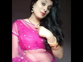 Pretty bhabhi Heena Kumari flaunts her navel in a transparent sari