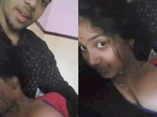 Cute Indian lover reveals his girlfriend's breasts in a steamy video